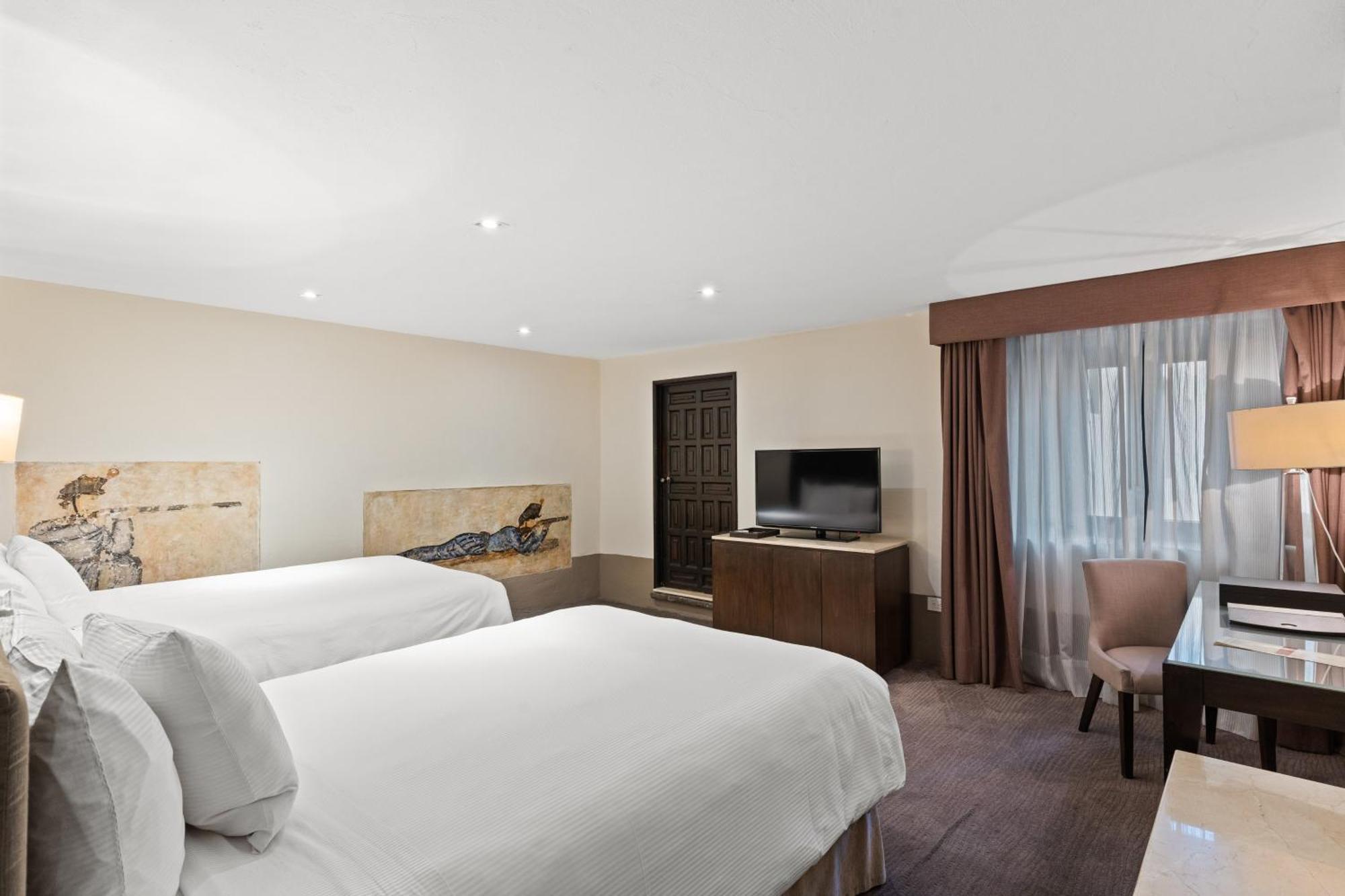 فندق Quinta Real بويبلا المظهر الخارجي الصورة A room at the hotel